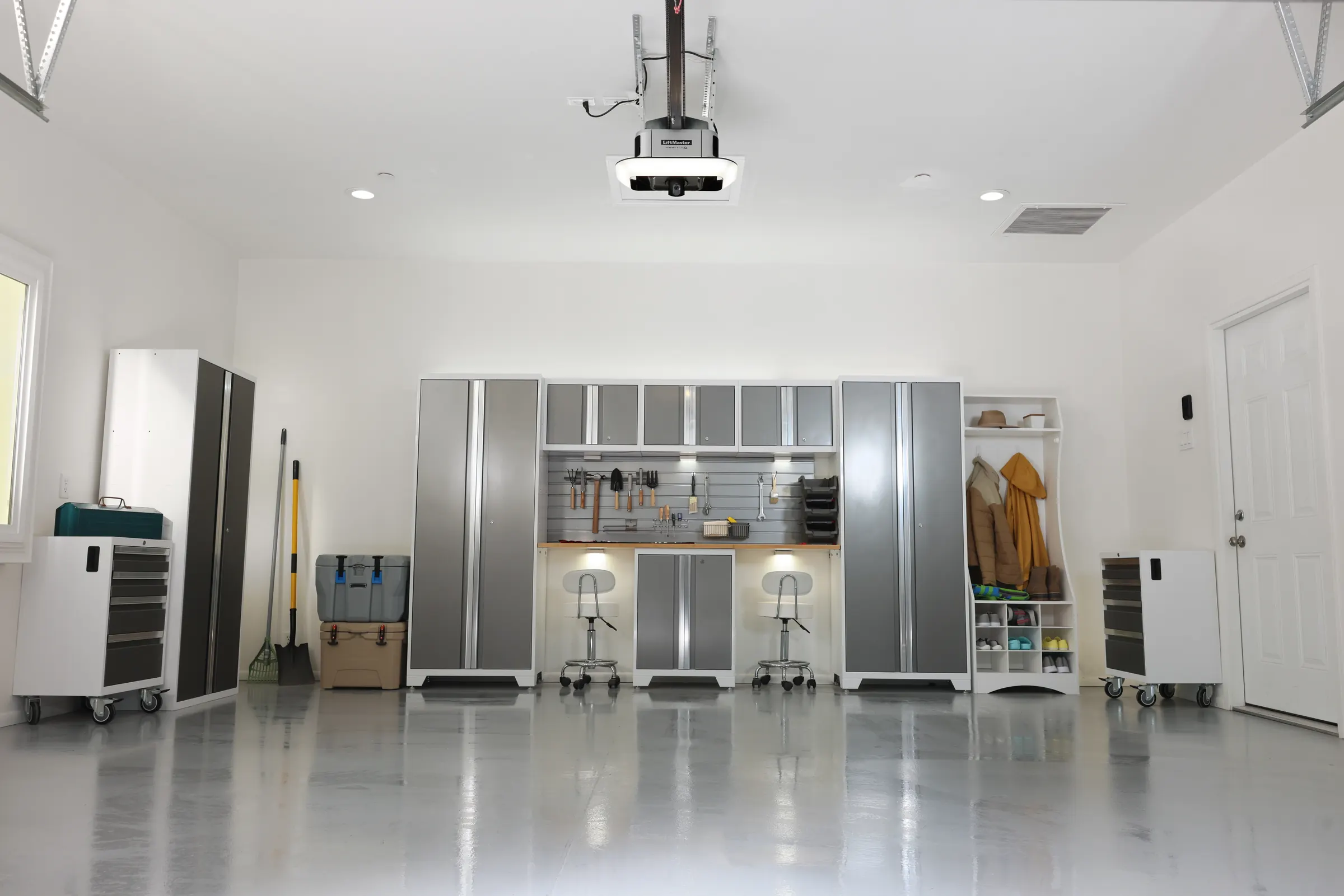 Finished garage with a LiftMaster opener mounted on the ceiling